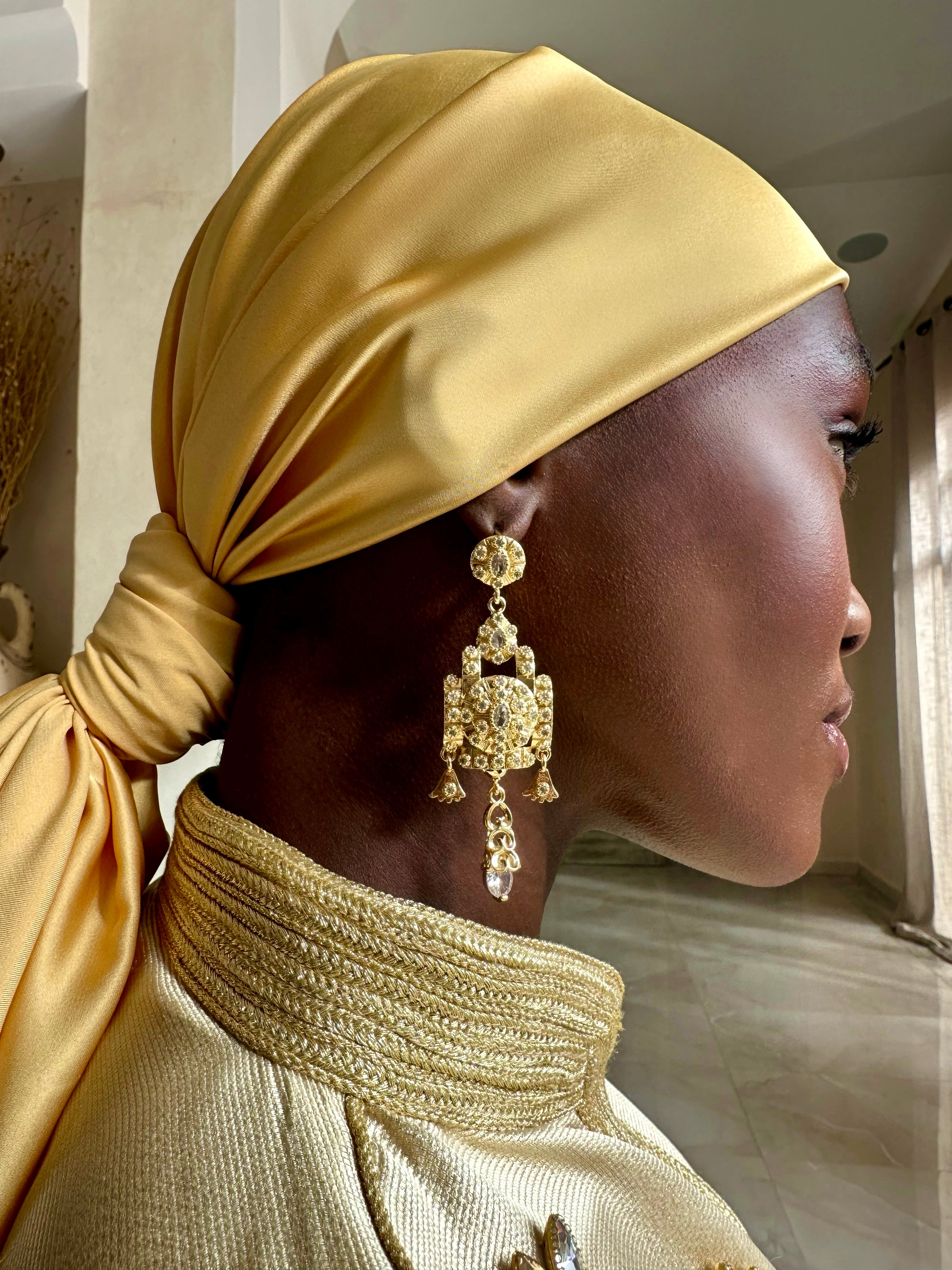 Gold chandelier earrings, sculpted statement design, oriental jewelry