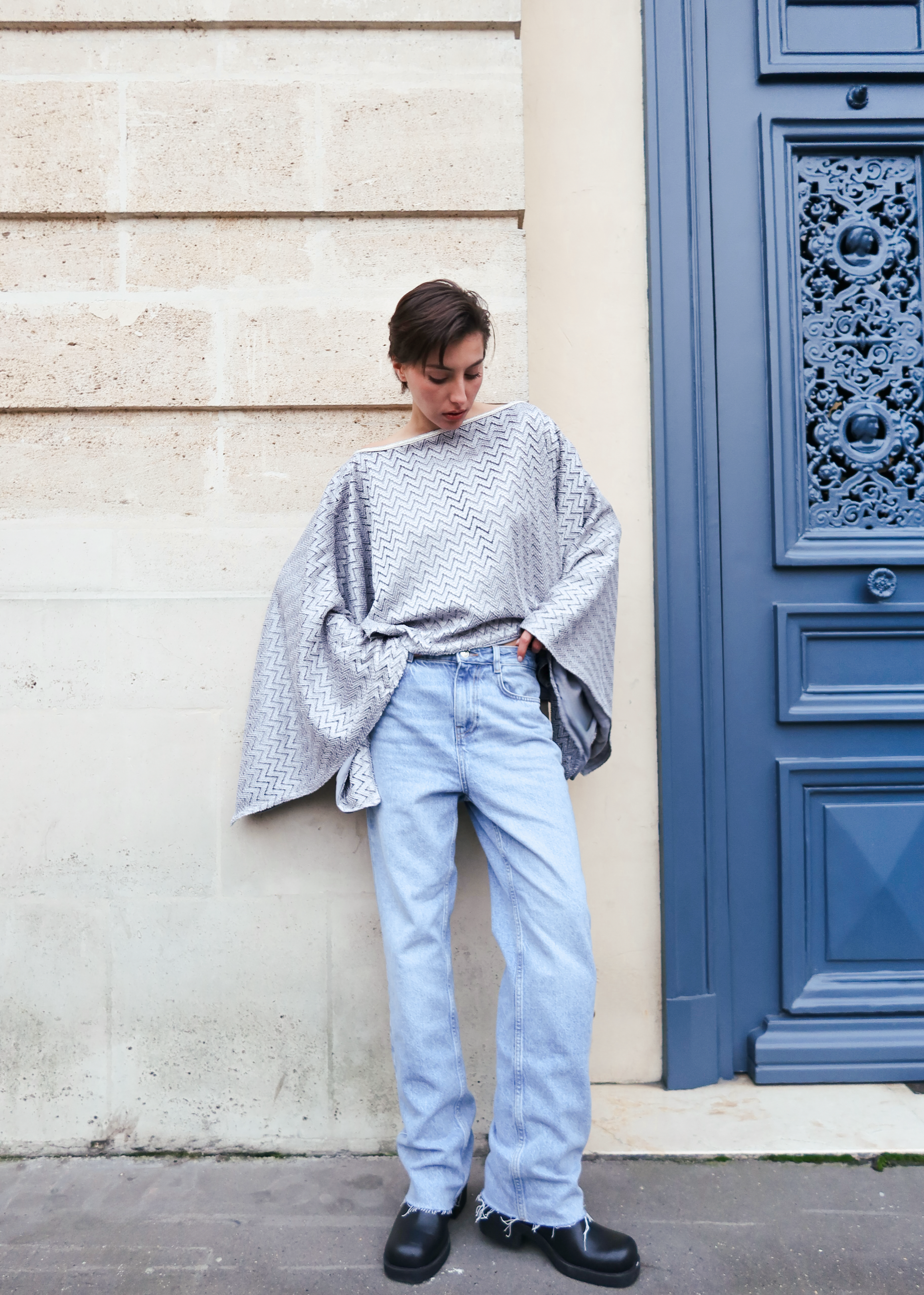 Gray top with a silver chevron jacquard pattern, front view