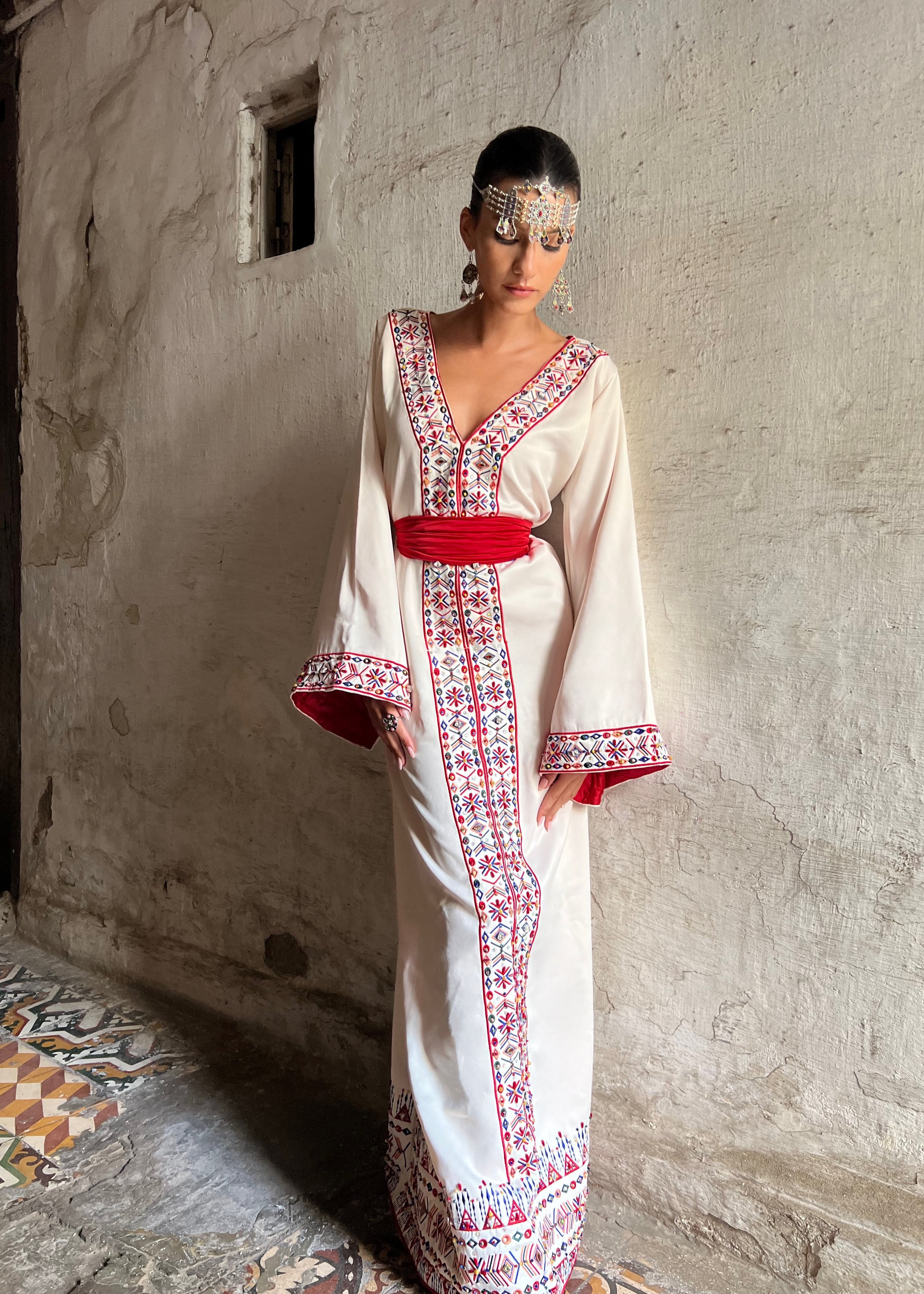 Embroidered Kabyle Kaftan seen from the front, featuring traditional motifs and rich, colorful embroidery.