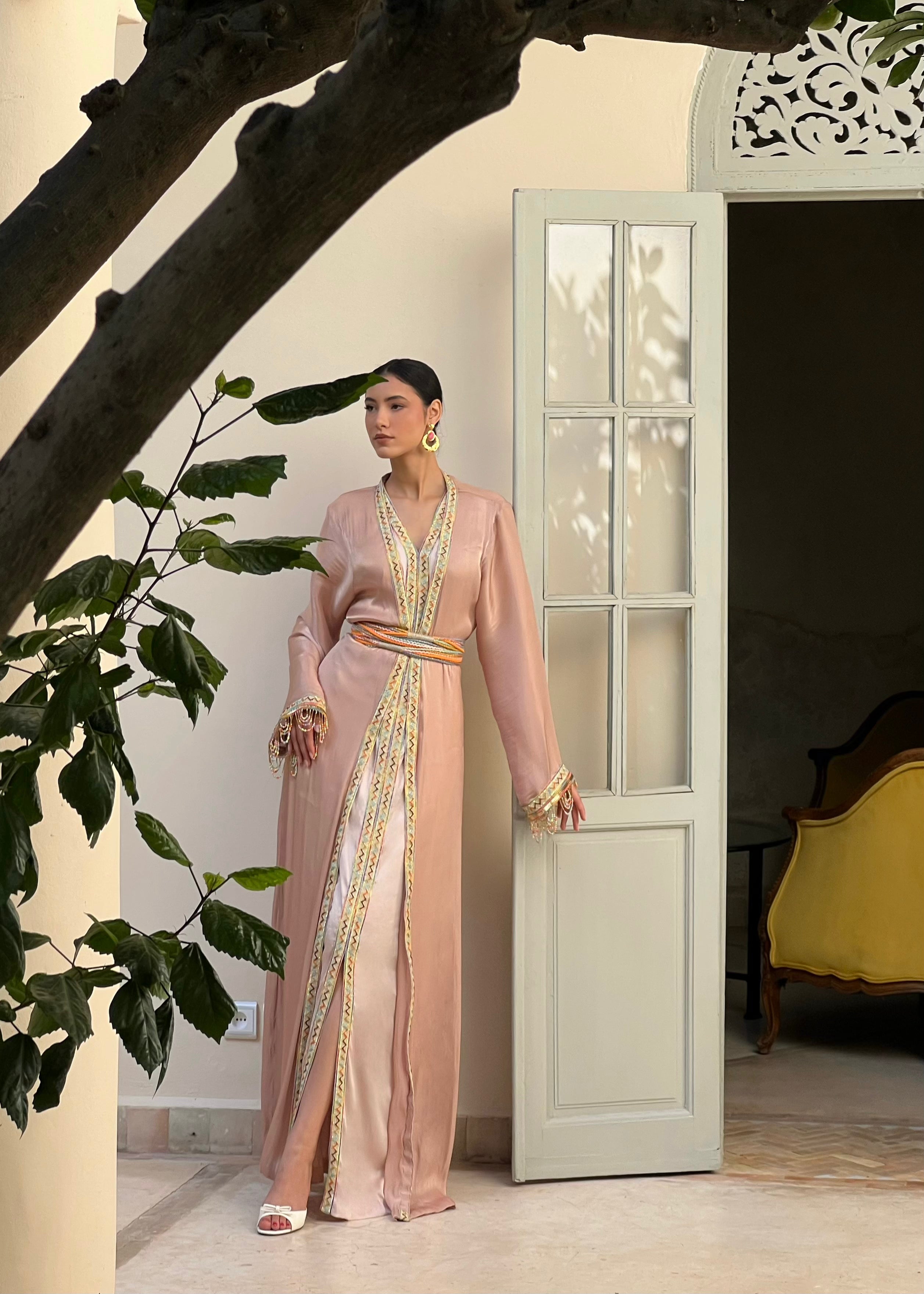 Kabyle Kaftan in pink organza embroidered in motion, light fabric and pearl sparkle in the light