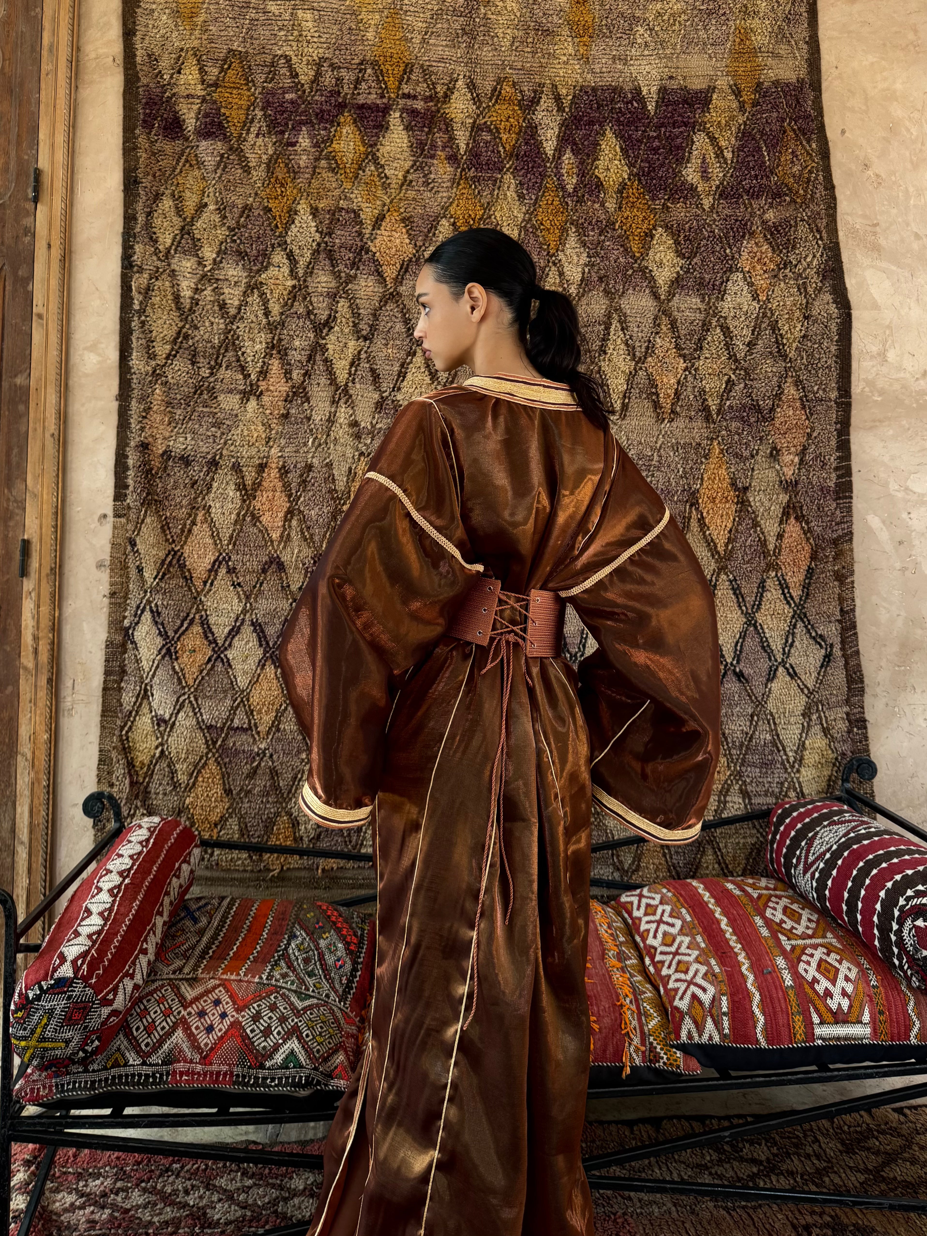 Back view of the modern metallic bronze satin Kaftan , fabric details and cut