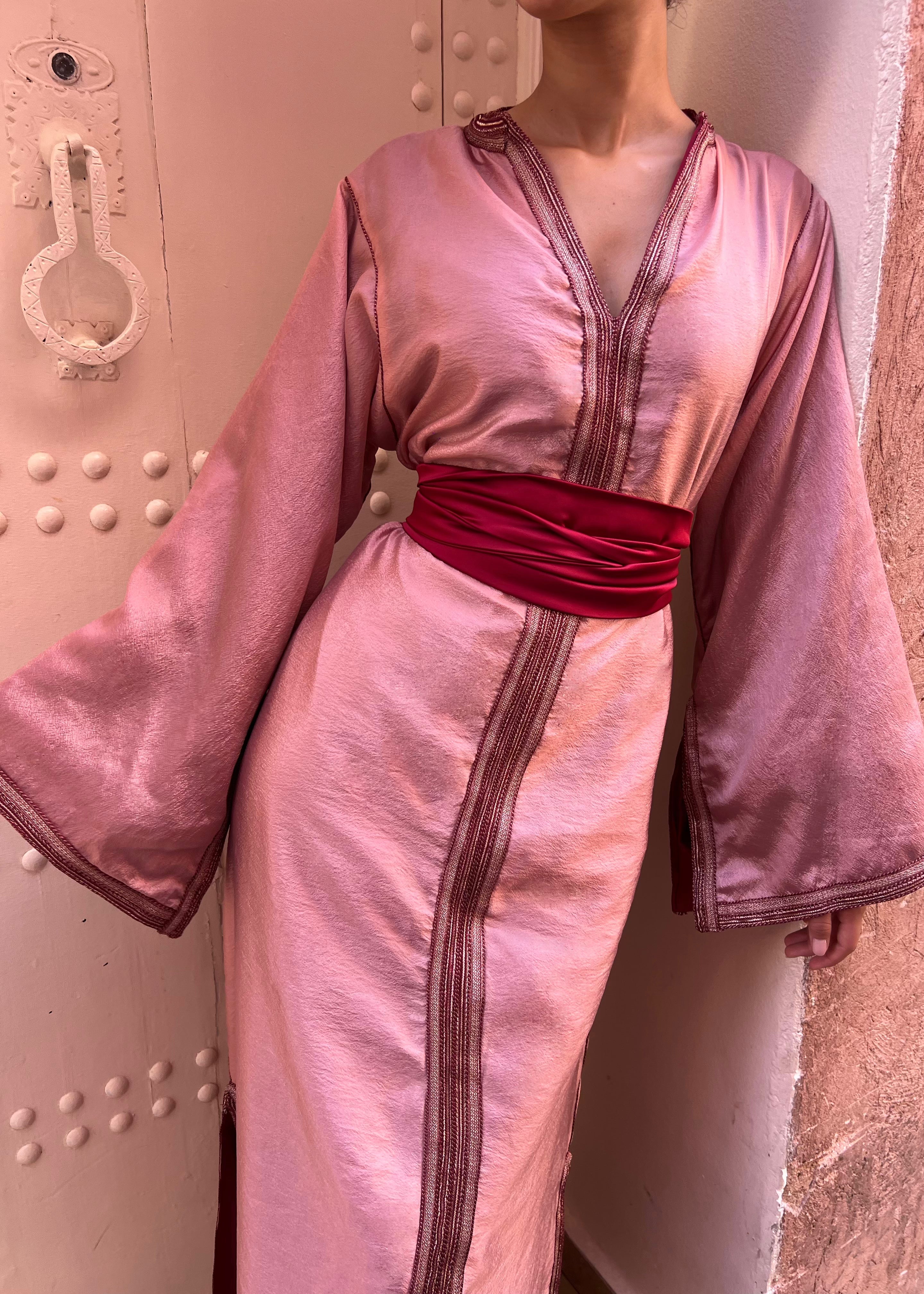 Modern Kaftan in pink draped satin, flowing and feminine cut, front view on model