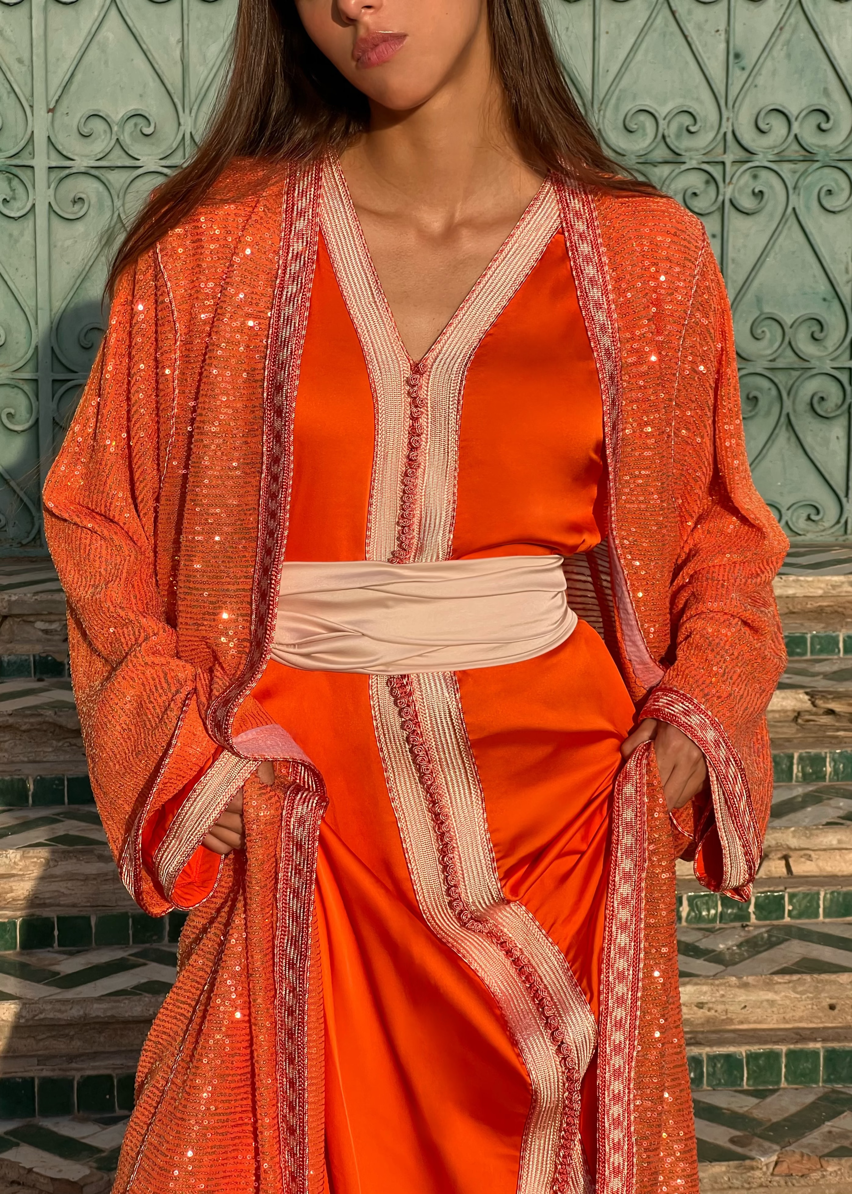 Orange Kaftan in beaded tulle, elegant cut and refined details, front view on mannequin