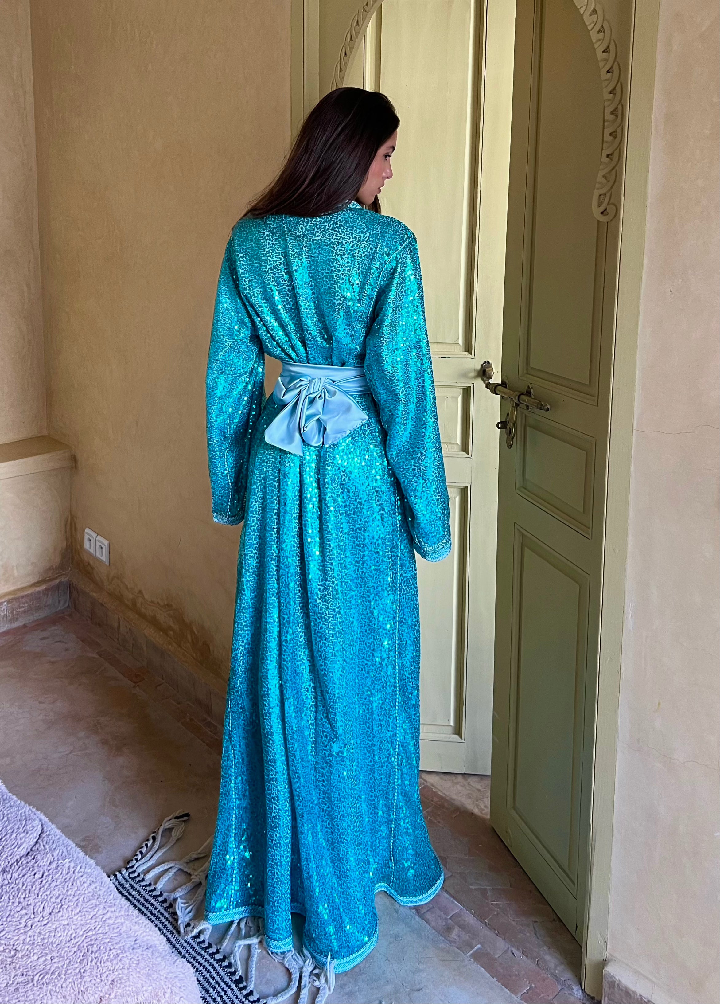 Turquoise Kaftan back in sequined tulle, silk lining and fluid fall of luminous fabric