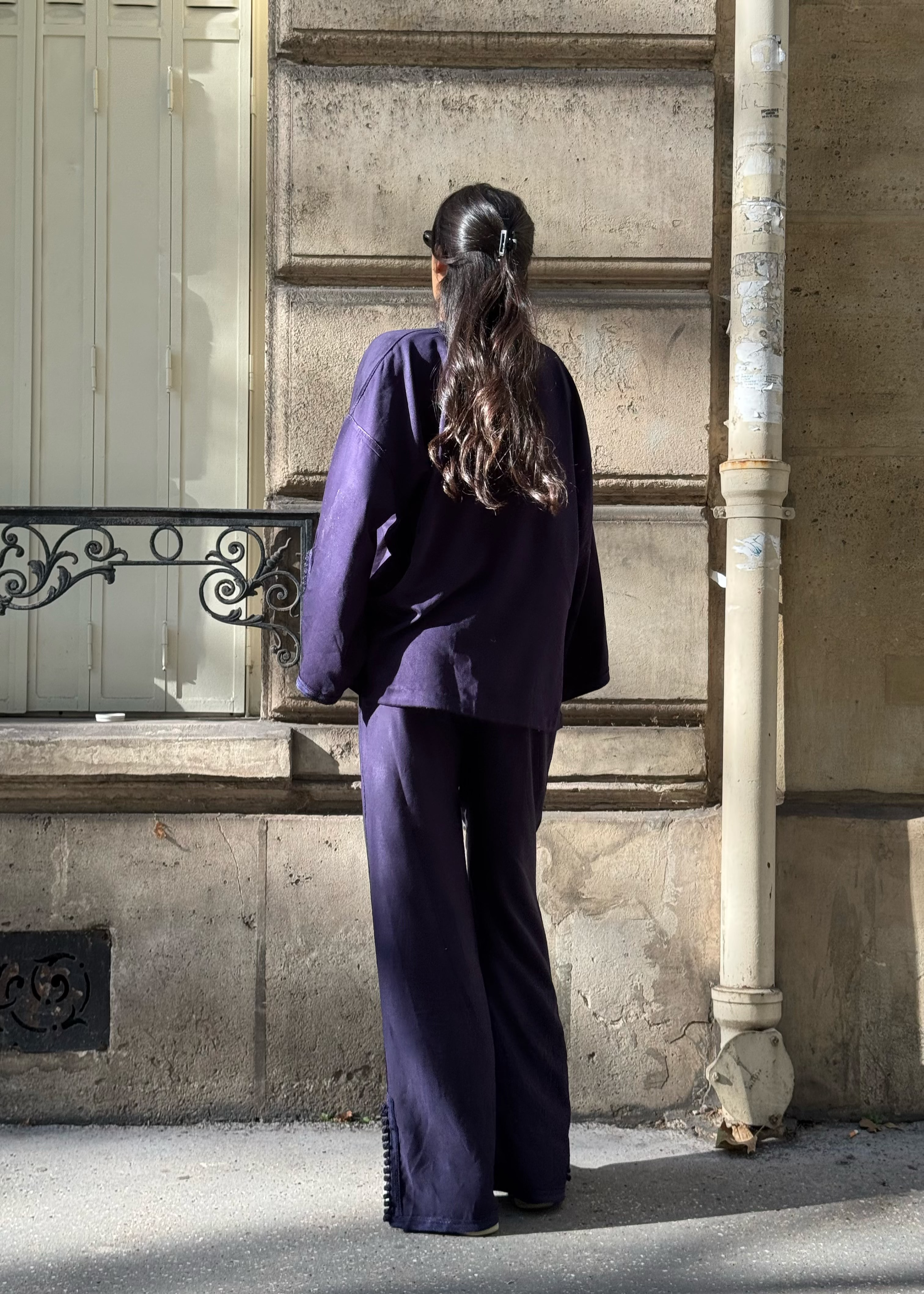 Back of modern oriental ensemble in navy blue Mlifa silk with handmade sfifa on shirt and pants