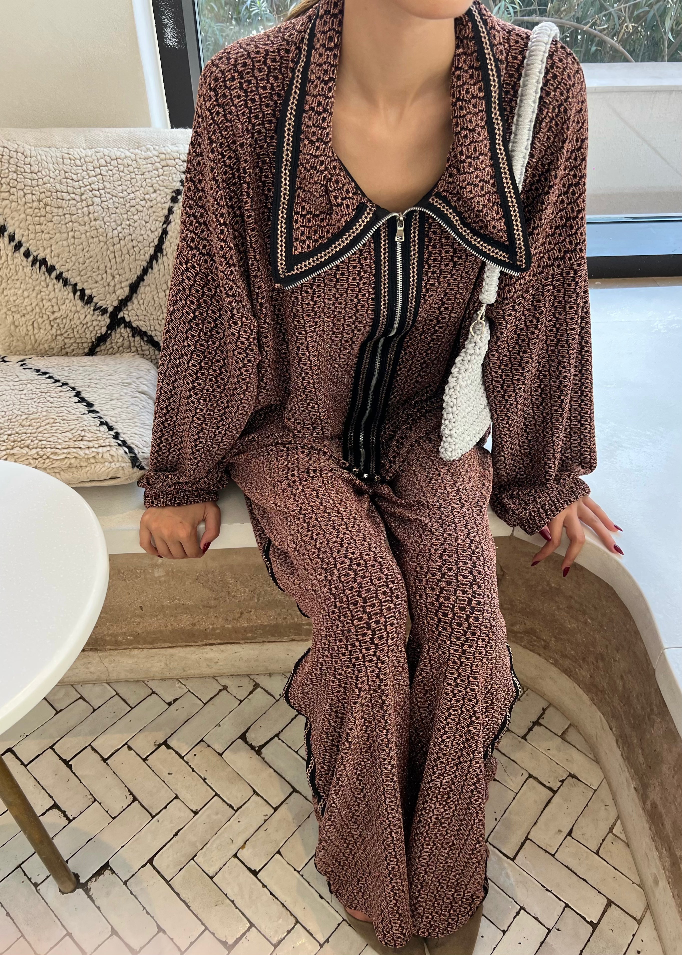 Sweatshirt and pant set in black and burgundy metallic brocaded jacquard, elegant and modern cut, front view on mannequin