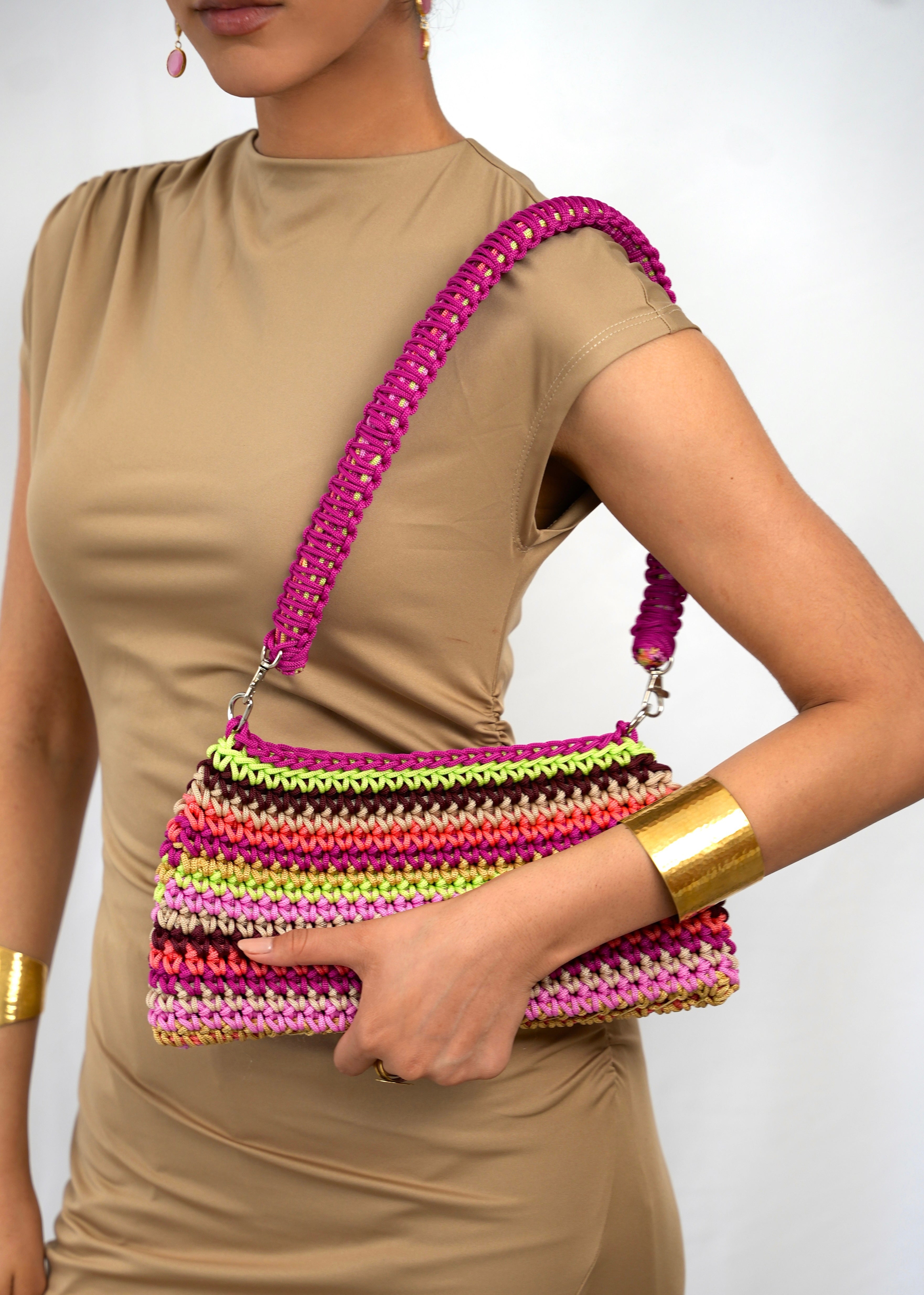 Studio detail of the trapeze bag in multicolored pink crochet, Moroccan handicraft