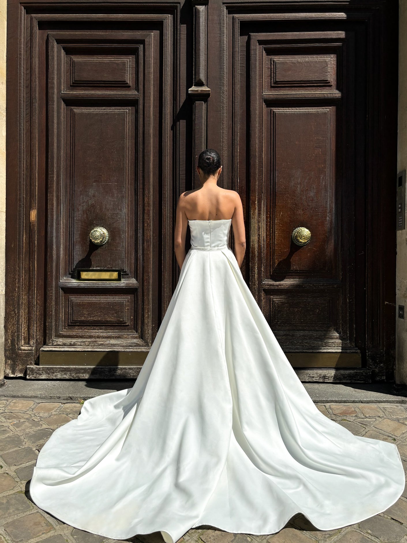 Princess wedding overskirt in Palace satin – back view showing the train and volume