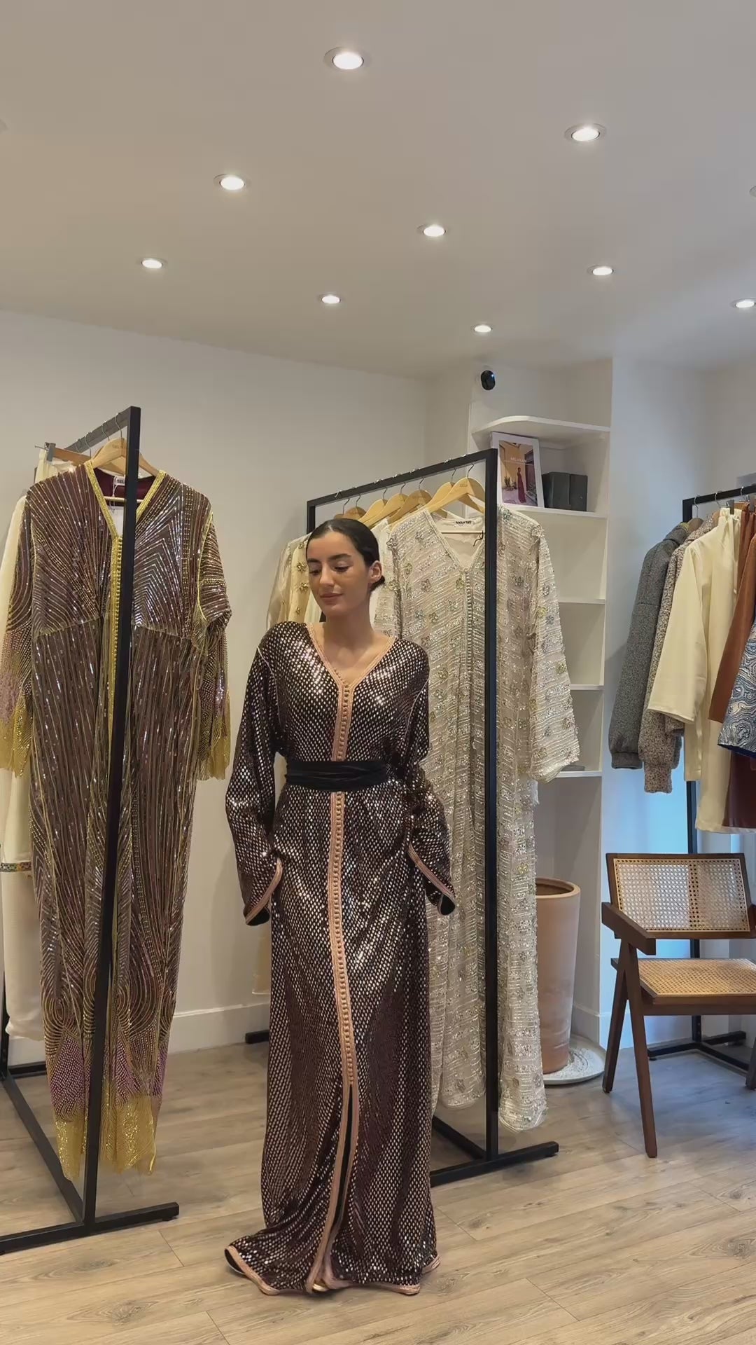 Front view of Kaftan black jersey Kaftan bronze diamond print 