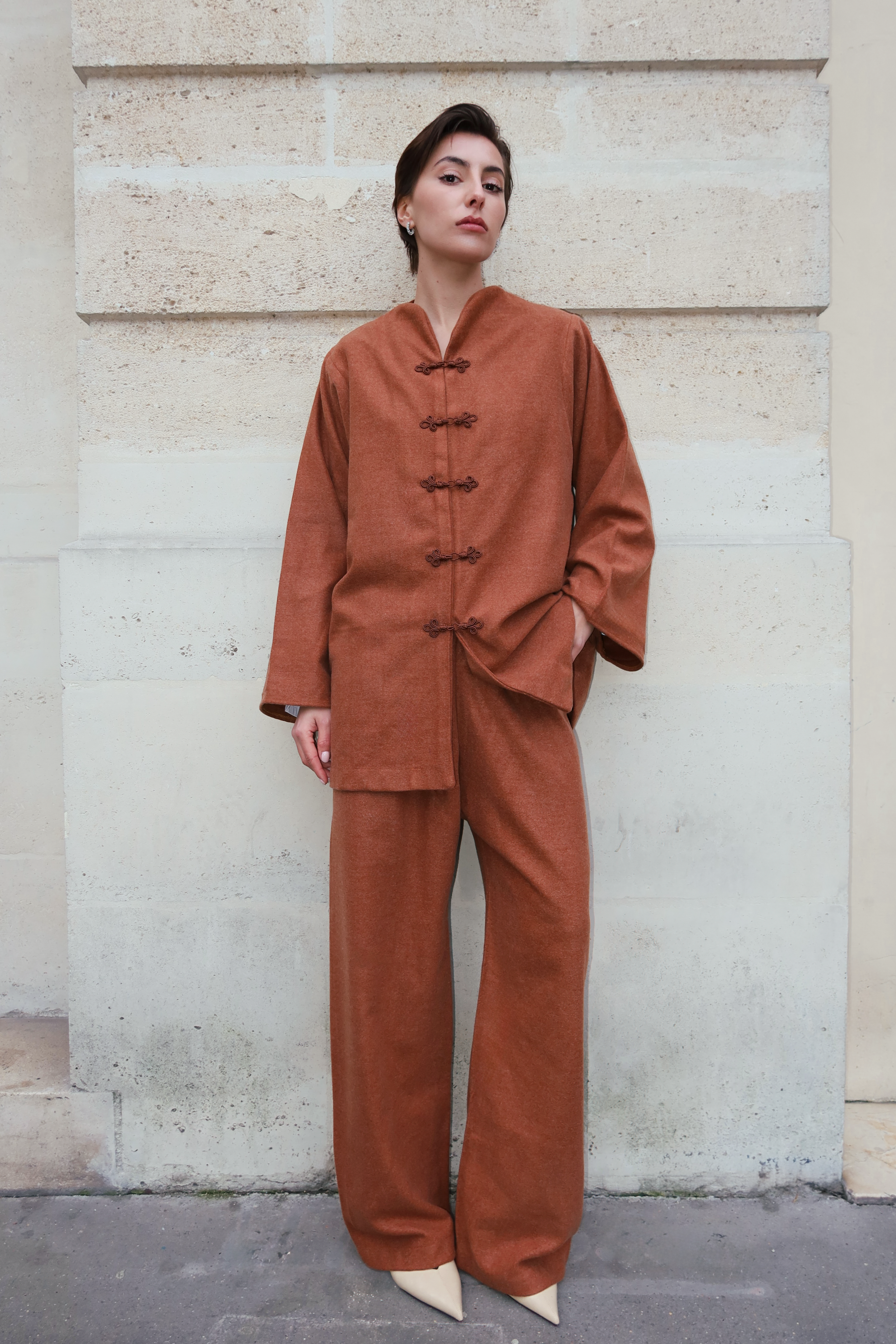 Brown cashmere ensemble photographed full length, with Moroccan buttons and chic style