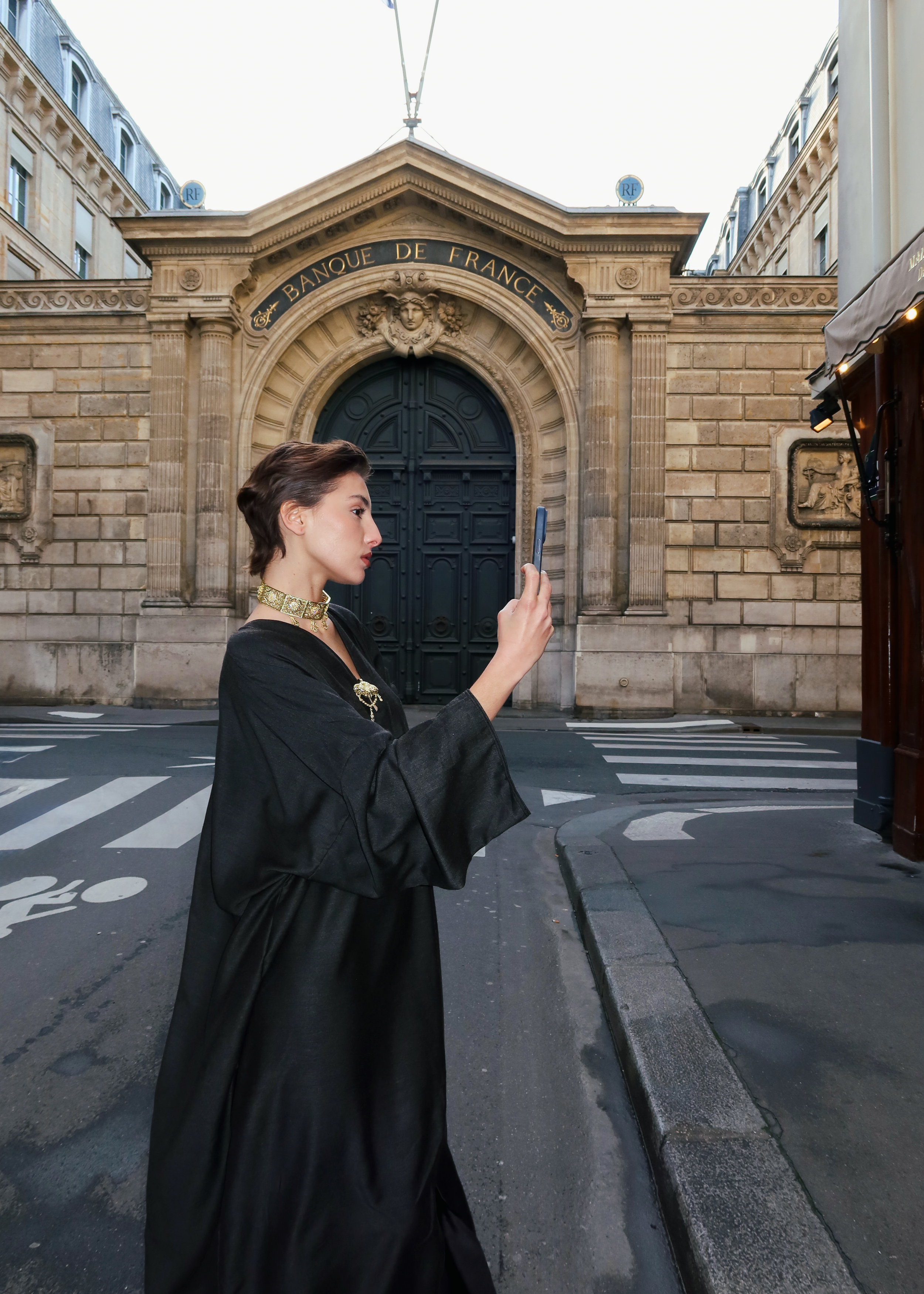 Grey Mlifa silk dress with movement, revealing a fluid drape and an elegant Moroccan look