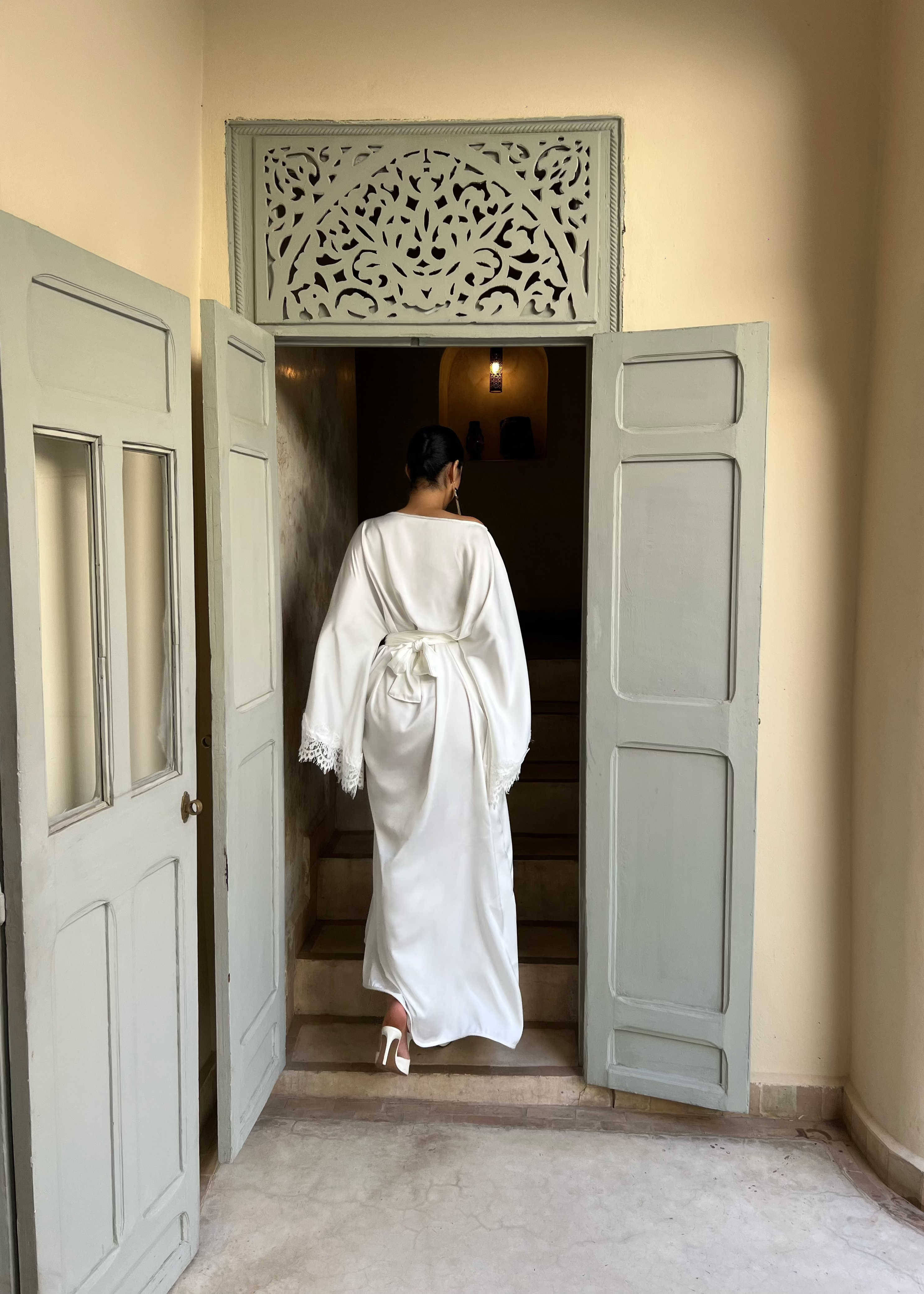 Bridal Kaftan back in white silk drape, flowing angel sleeves and refined lace trim