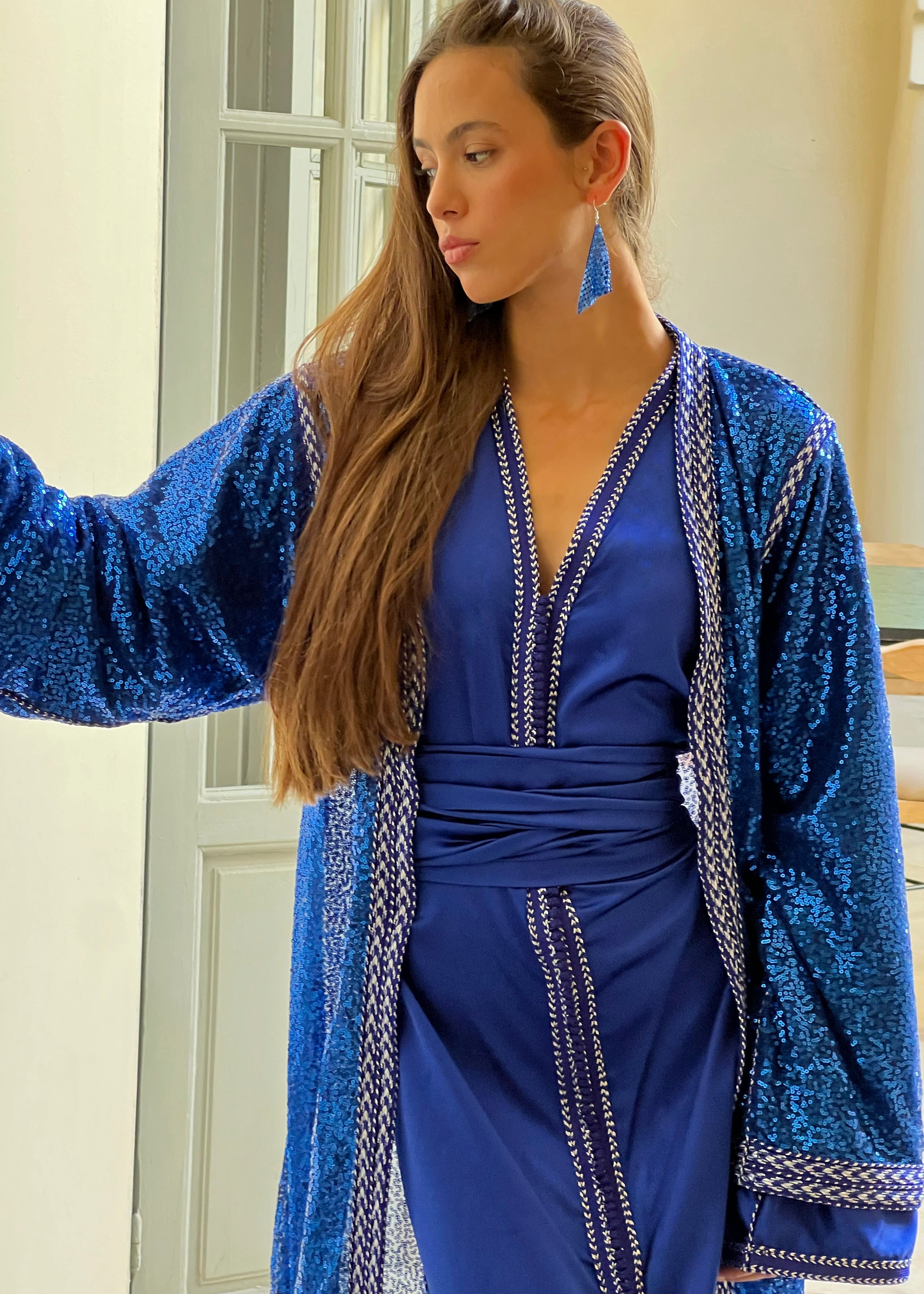 Detail of the blue Kaftan 's sequined tulle, fine embroidery and delicately applied pearls