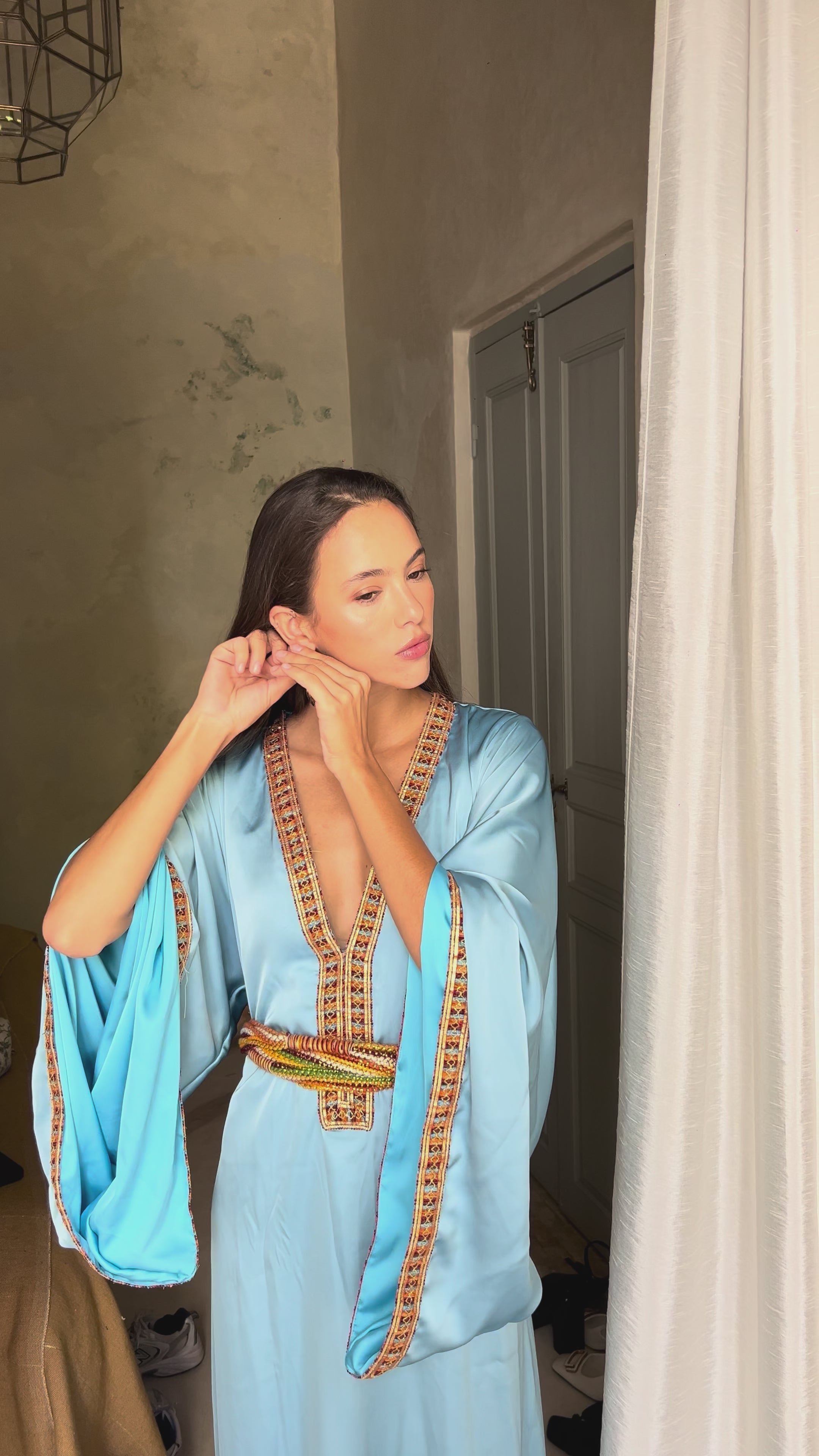 Video of a Kabyle Kaftan in blue silk with traditional embroidery - elegant Berber attire for weddings or ceremonies.