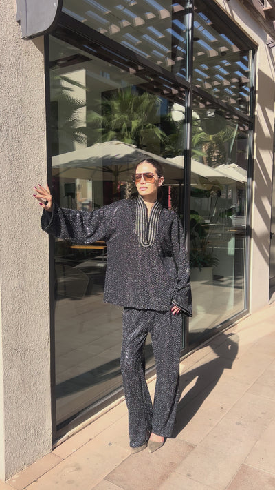 Shirt and pants ensemble in shimmering black jacquard with Moroccan sfifa, a chic and refined outfit.