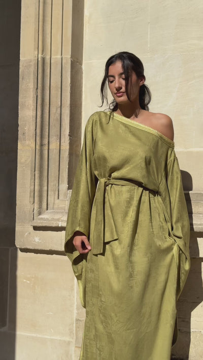 Moroccan dress in green jacquard Mlifa silk with handmade sfifa, butterfly sleeves, belt and boat neck.