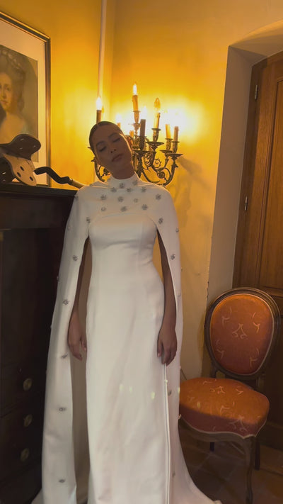 Video of the Palace satin bridal cape with rhinestones - a moving view highlighting the sparkle of the rhinestones and the fluidity of the satin.