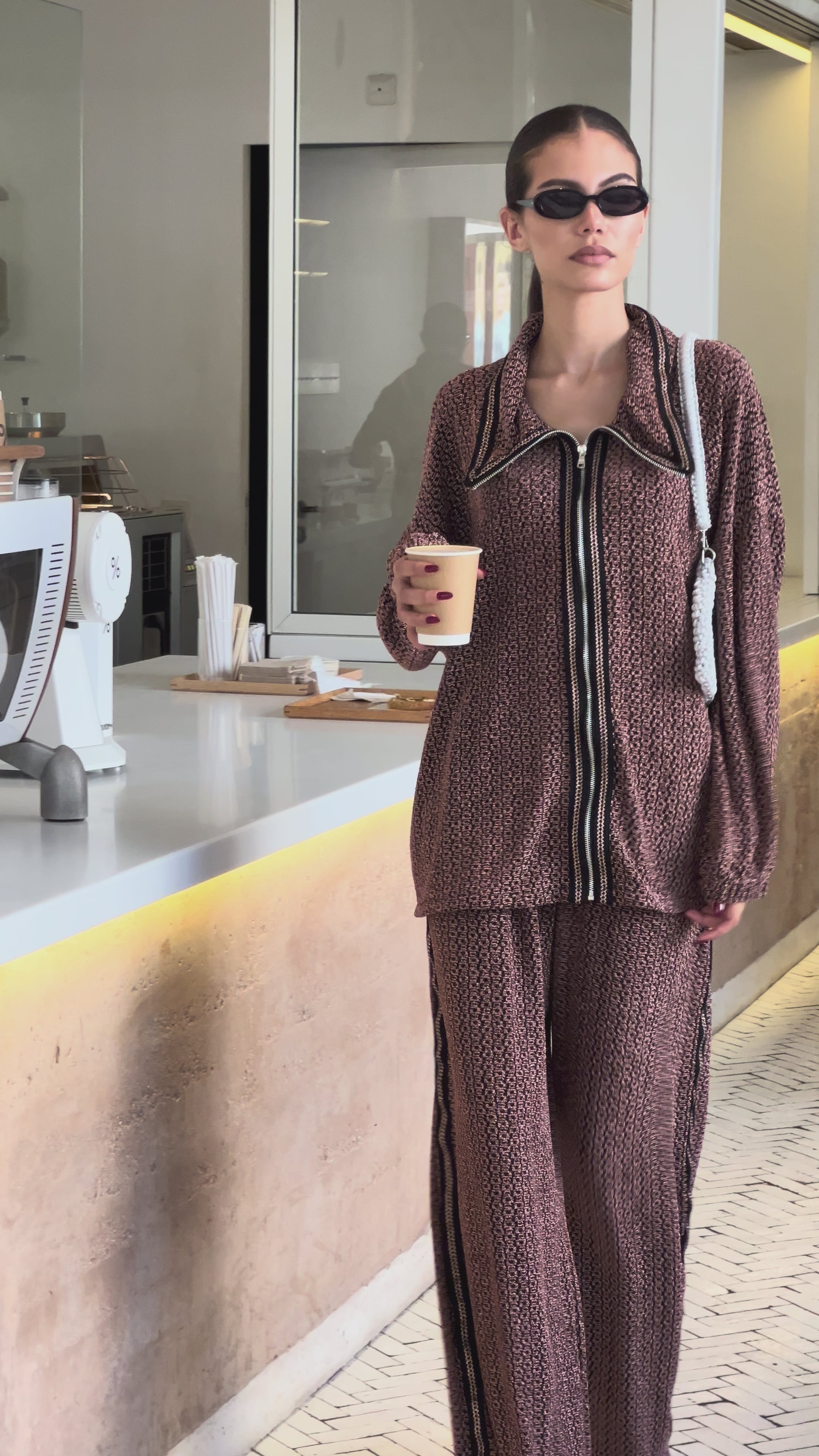 Gold, green and burgundy brocaded jacquard hoodie and pants ensemble with Moroccan sfifa, a modern and elegant outfit.