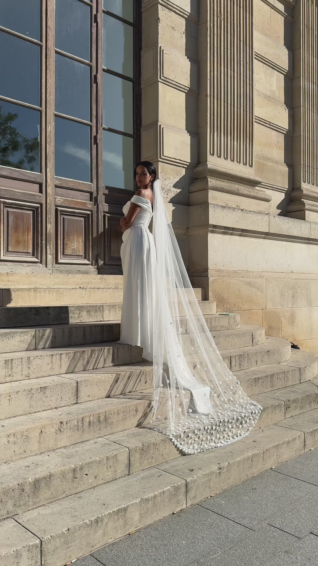 Video of cathedral bridal veil with 3D flowers, presented from several angles and in motion