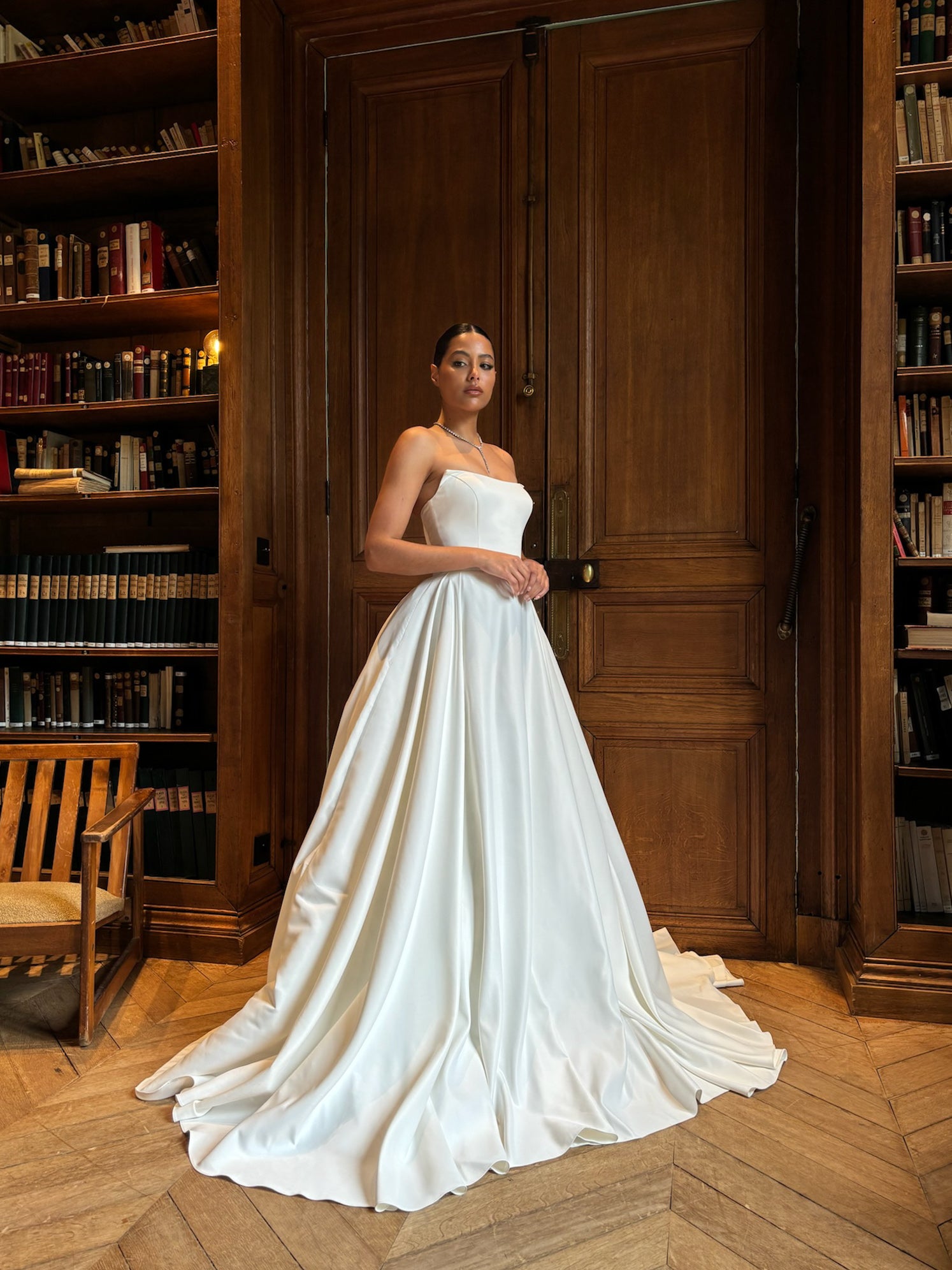 Strapless princess wedding gown in Palace satin - 3/4 view highlighting volume and cut
