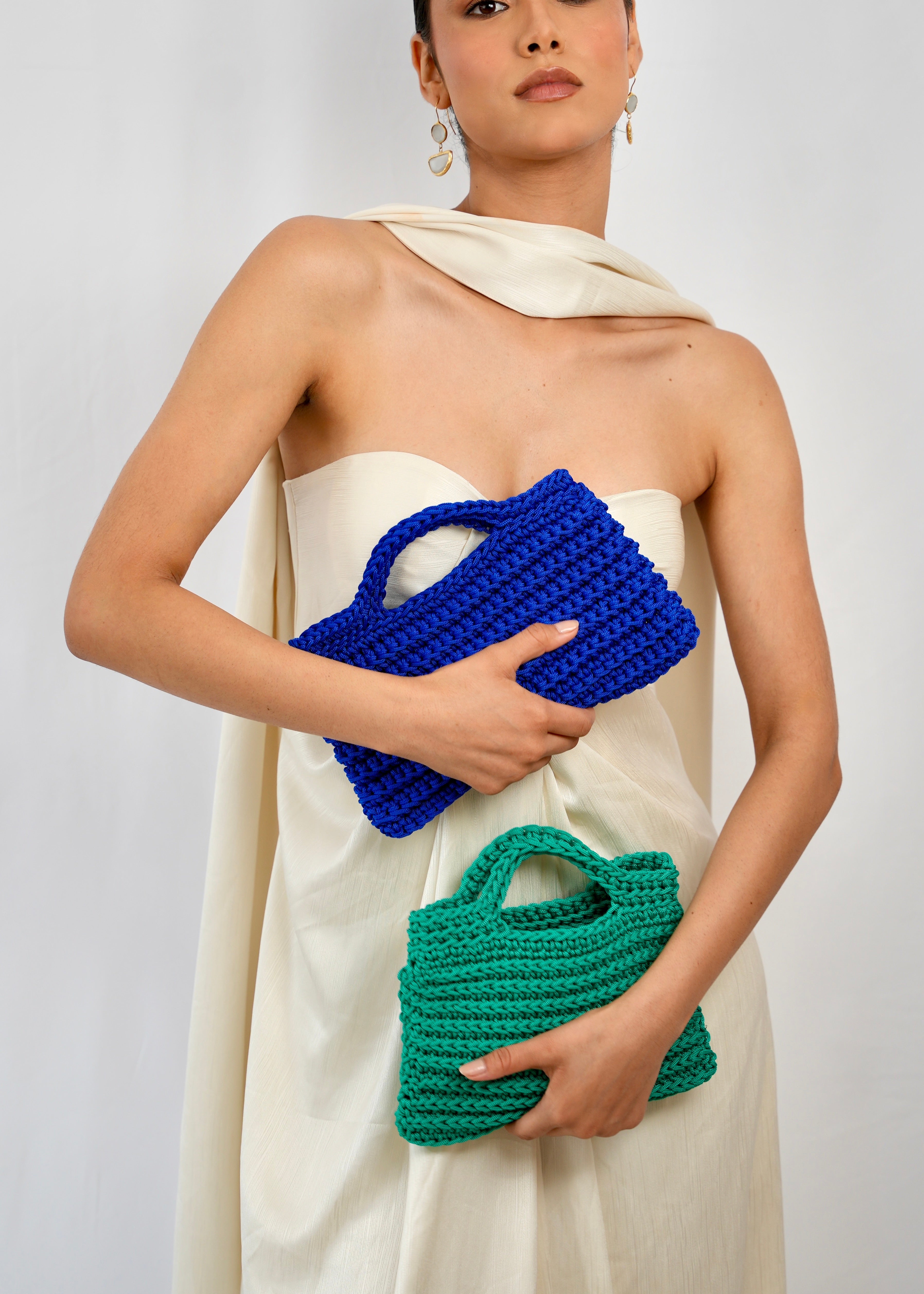Two midnight blue crochet square bags presented in the studio, Moroccan craftsmanship
